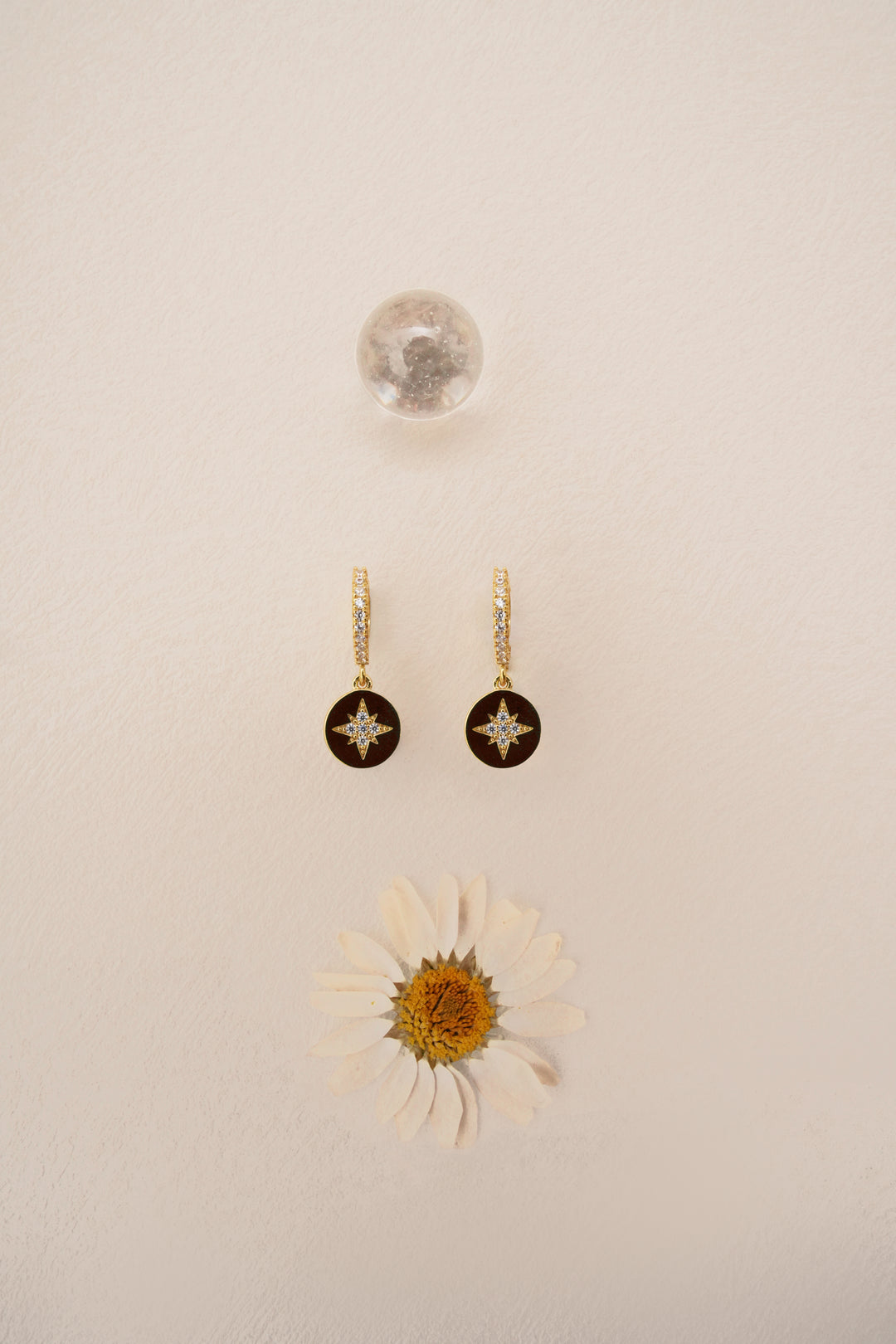 jewelry collection featuring handcrafted earrings inspired by Eastern elegance and modern femininity
